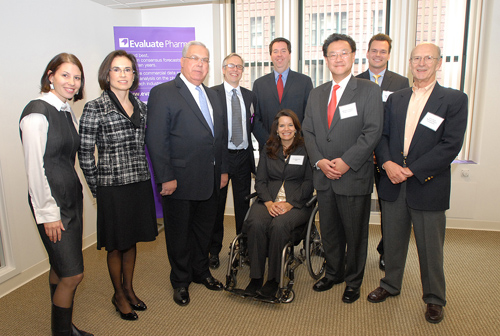 Life Sciences Center Vice President for Communications Angus McQuilken (fifth from left) joins with Boston Mayor Thomas Menino, officials from the Boston Redevelopment Authority’s LifeTech Initiative, and executives from EvaluatePharma at a ribbon-cutting ceremony to welcome the company and three others to Boston.