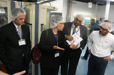 Life Sciences leaders tour the manufacturing space at Morgan Advanced Ceramics in New Bedford, a recipient of a 2009 award from the Life Sciences Tax Incentive Program. The company received tax incentives totaling $570,000, and in exchange committed to creating nineteen new jobs in 2010 as part of a 25,000 square foot expansion. Pictured from left to right are MassBio President Robert Coughlin, Life Sciences Center President & CEO Susan Windham-Bannister, Buddy Rocha from the Massachusetts Office on Business Development, and Morgan Advanced Ceramics Vice President & General Manager Brian Roznoy.