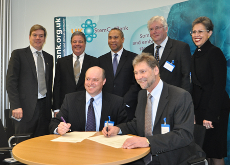 Governor Deval Patrick, Dr. Windham-Bannister and UMass President-elect Robert Caret witness the signing of an agreement between the University of Massachusetts Stem Cell Bank & Registry and the UK Stem Cell Bank.  (Photo credit: Kim Haberlin, EOHED)